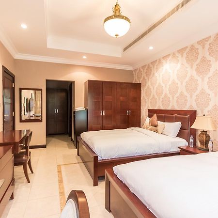 Yanjoon Holiday Homes - Palm Jumeirah Frond A Villas ดูไบ ภายนอก รูปภาพ