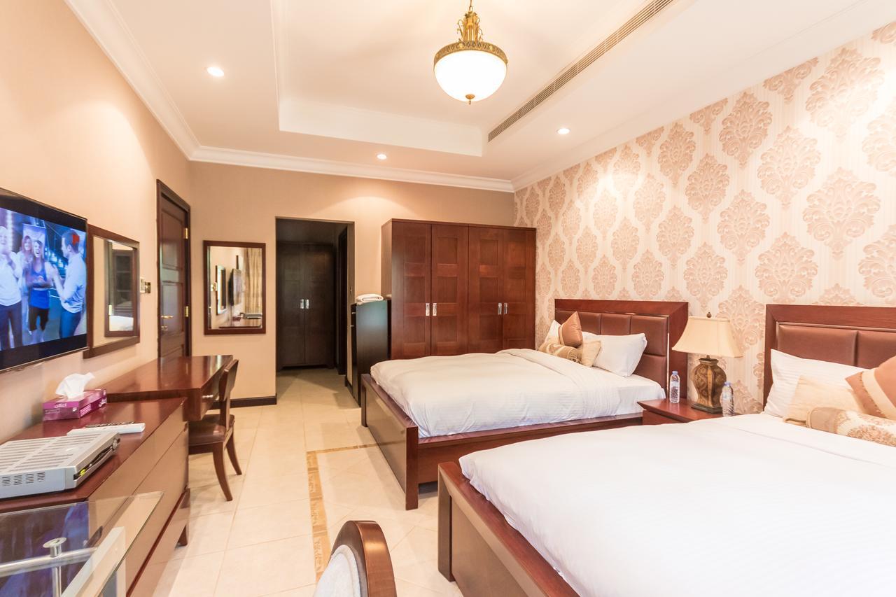 Yanjoon Holiday Homes - Palm Jumeirah Frond A Villas ดูไบ ภายนอก รูปภาพ