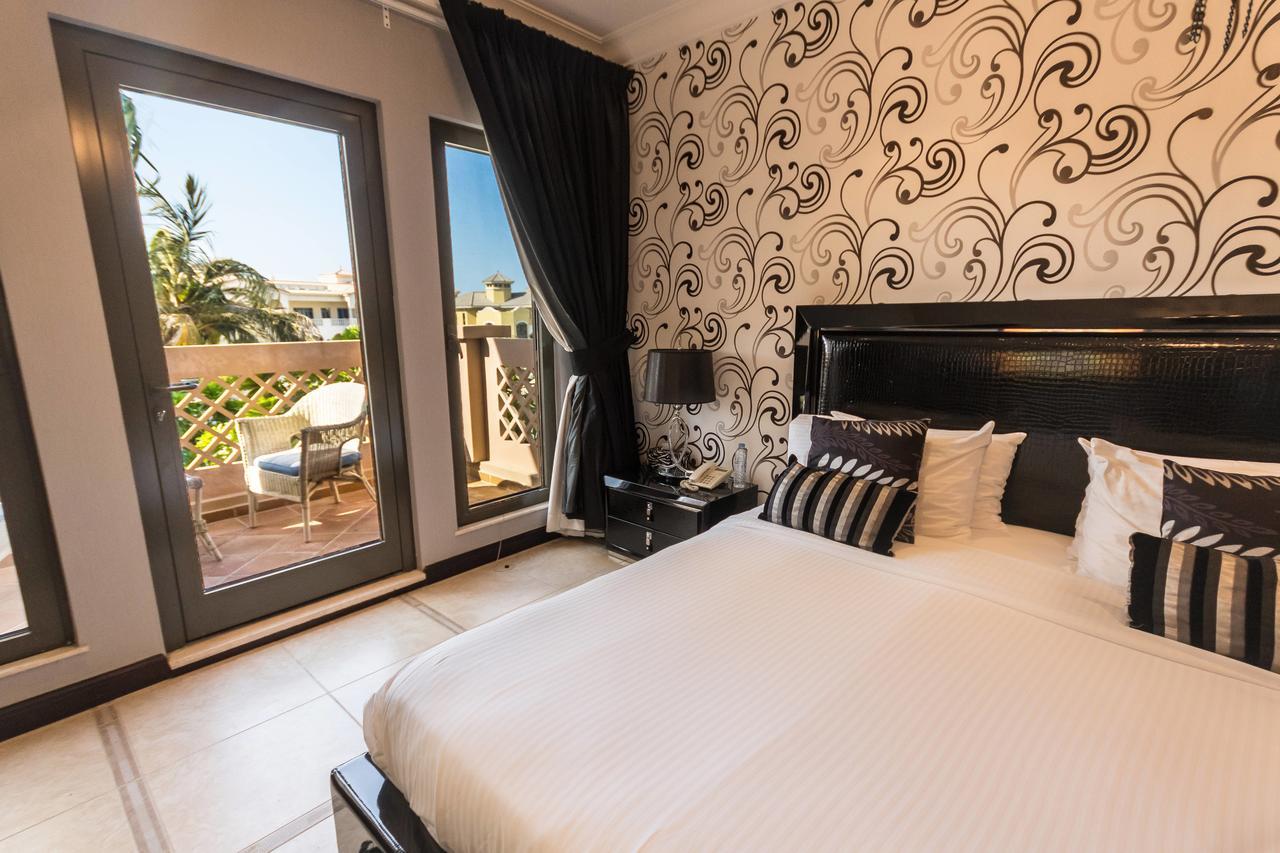 Yanjoon Holiday Homes - Palm Jumeirah Frond A Villas ดูไบ ภายนอก รูปภาพ